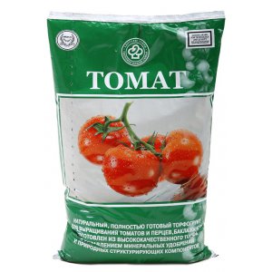 Een pretentieloze, maar zeer smakelijke variëteit aan tomaten Het wonder van de markt met een rijke oogst is een favoriet van ervaren tuiniers