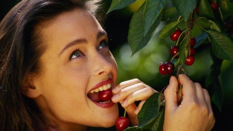 Why are cherry berries useful for a woman's body